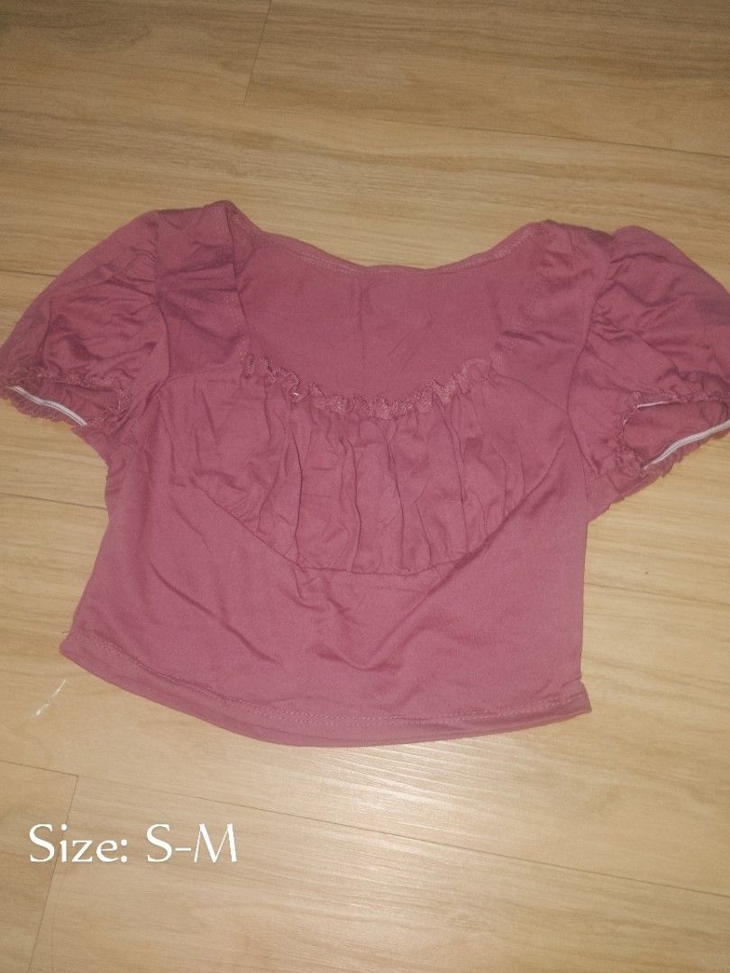 Assorted 6 Crop Tops Bundle of Multiple Colors and Styles (Category: Shirts) located in Naga. Submitted by francethriftee3 (Listing ID 1470559841, Image 2). Description: Location: Camarines Sur, Bicol - Bundle of assorted crop tops in pink, red, terracotta, and beige - Features various styles: ruched, off-shoulder, collared, and more - Mixed sleeve lengths and necklines - Sizes range from S to L across the bundle - Great variety of ready-to-wear 