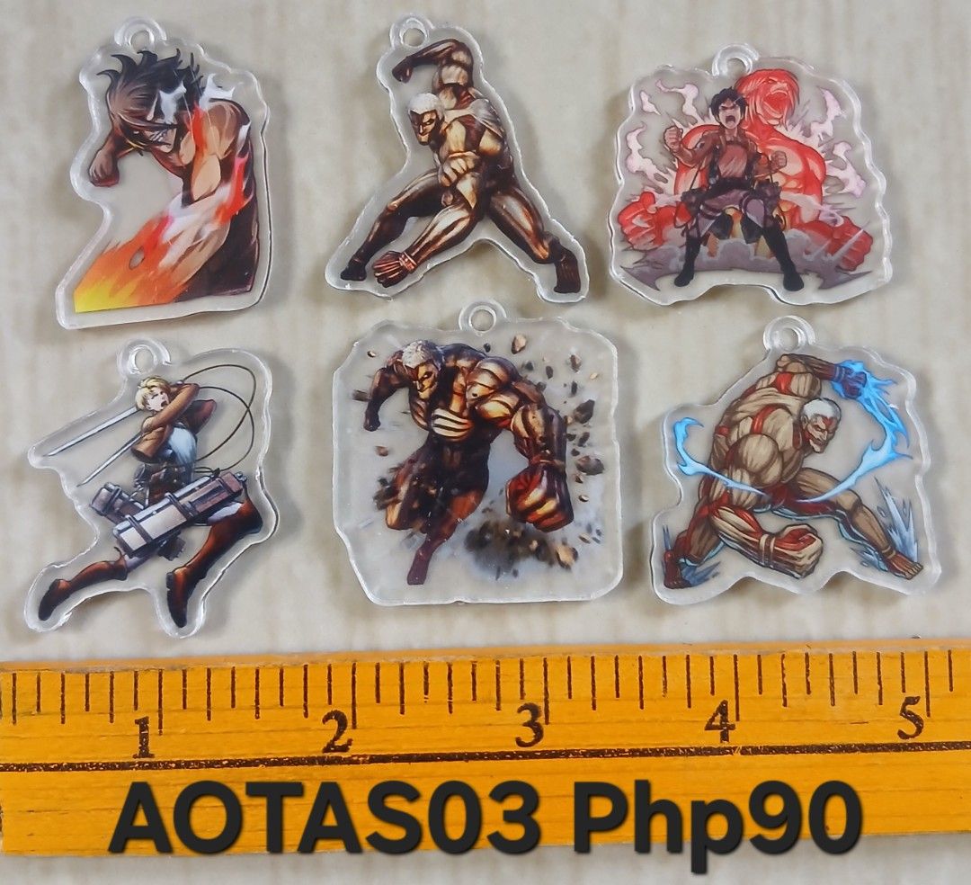 ASSORTED ACRYLIC CHARMS BY SET (Category: Handmade Craft) located in Cavite. Submitted by jiearah.online.shop (Listing ID 1470617862, Image 2). Description: ASSORTED ACRYLIC CHARMS SET Selling as is. ACTUAL ITEM ON PHOTO. Price indicated on each photo. PER SET PO,NOT PER PIECE. Kung ano po ang nasa photo,yun po ang magkakasama. Anime and Character Design : Attack On Titan, Bungo Stray Dogs, Miku, JJK Gojo, Frieren, Enhypen, Digital Circus, Sylvan