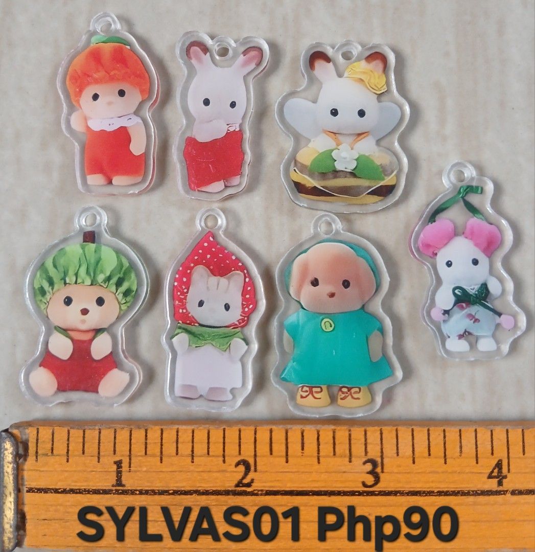ASSORTED ACRYLIC CHARMS BY SET (Category: Handmade Craft) located in Cavite. Submitted by jiearah.online.shop (Listing ID 1470618141, Image 3). Description: ASSORTED ACRYLIC CHARMS SET Selling as is. ACTUAL ITEM ON PHOTO. Price indicated on each photo. PER SET PO,NOT PER PIECE. Kung ano po ang nasa photo,yun po ang magkakasama. Anime and Character Design : Attack On Titan, Bungo Stray Dogs, Miku, JJK Gojo, Frieren, Enhypen, Digital Circus, Sylvan