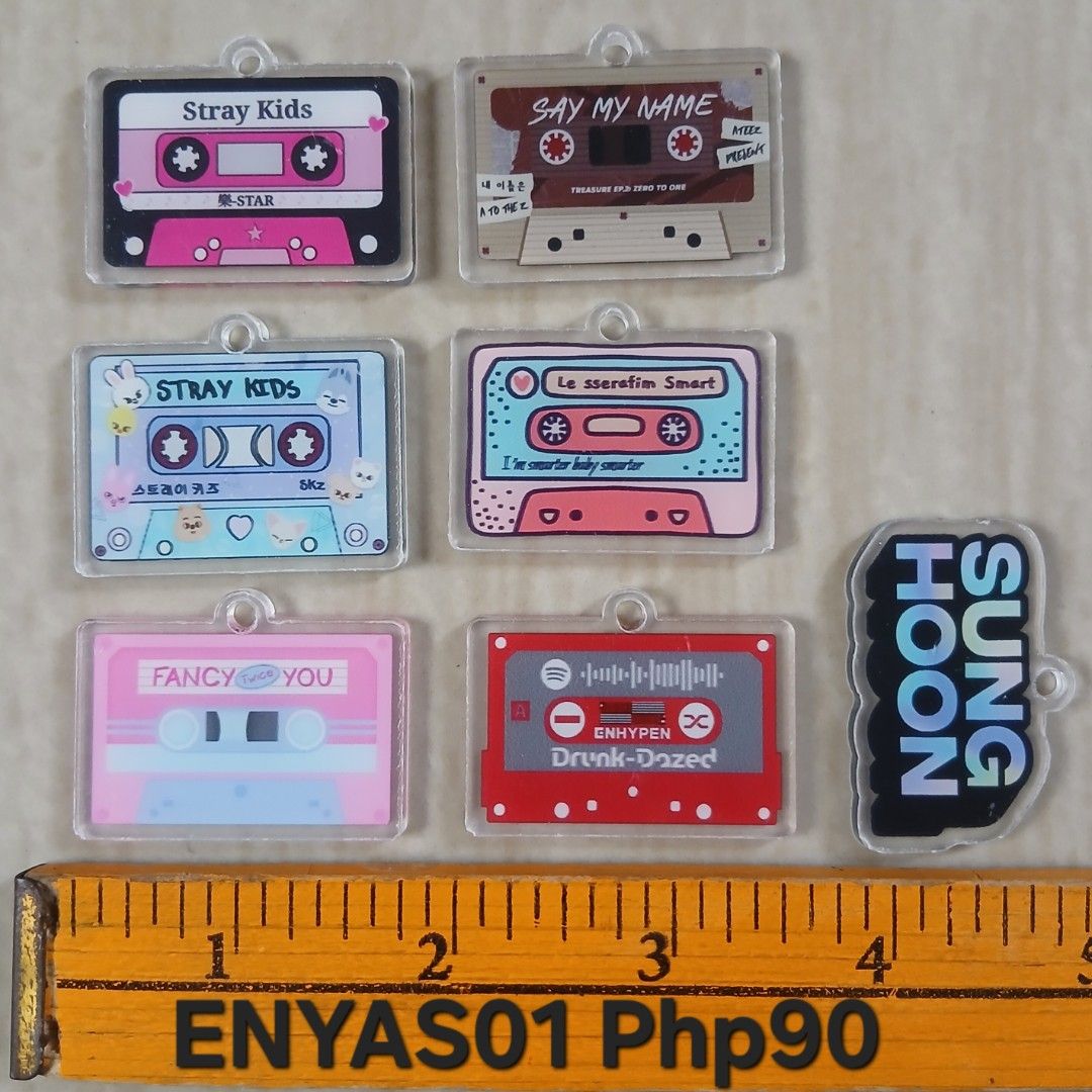 ASSORTED ACRYLIC CHARMS BY SET (Category: Handmade Craft) located in Cavite. Submitted by jiearah.online.shop (Listing ID 1470618141, Image 1). Description: ASSORTED ACRYLIC CHARMS SET Selling as is. ACTUAL ITEM ON PHOTO. Price indicated on each photo. PER SET PO,NOT PER PIECE. Kung ano po ang nasa photo,yun po ang magkakasama. Anime and Character Design : Attack On Titan, Bungo Stray Dogs, Miku, JJK Gojo, Frieren, Enhypen, Digital Circus, Sylvan