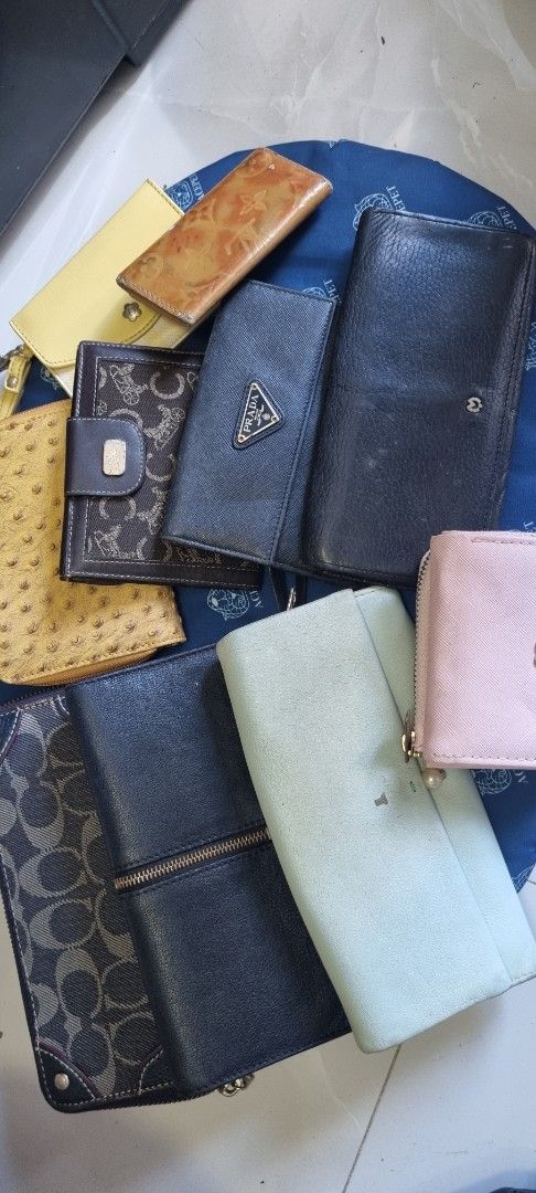 Assorted Designer and Branded Wallets Collection (Category: Wallets & Card holders) located in Manila. Submitted by luiday919 (Listing ID 1470611076, Image 1). Description: -Project wallet - Brand assortment: Includes pieces from Coach, Prada, Celine, and more - Variety of styles: Long zip-arounds, flap closures, and compact cardholders - Diverse designs: Different colors, materials, and textured leather finishes - Perfect for daily use: Mix and 