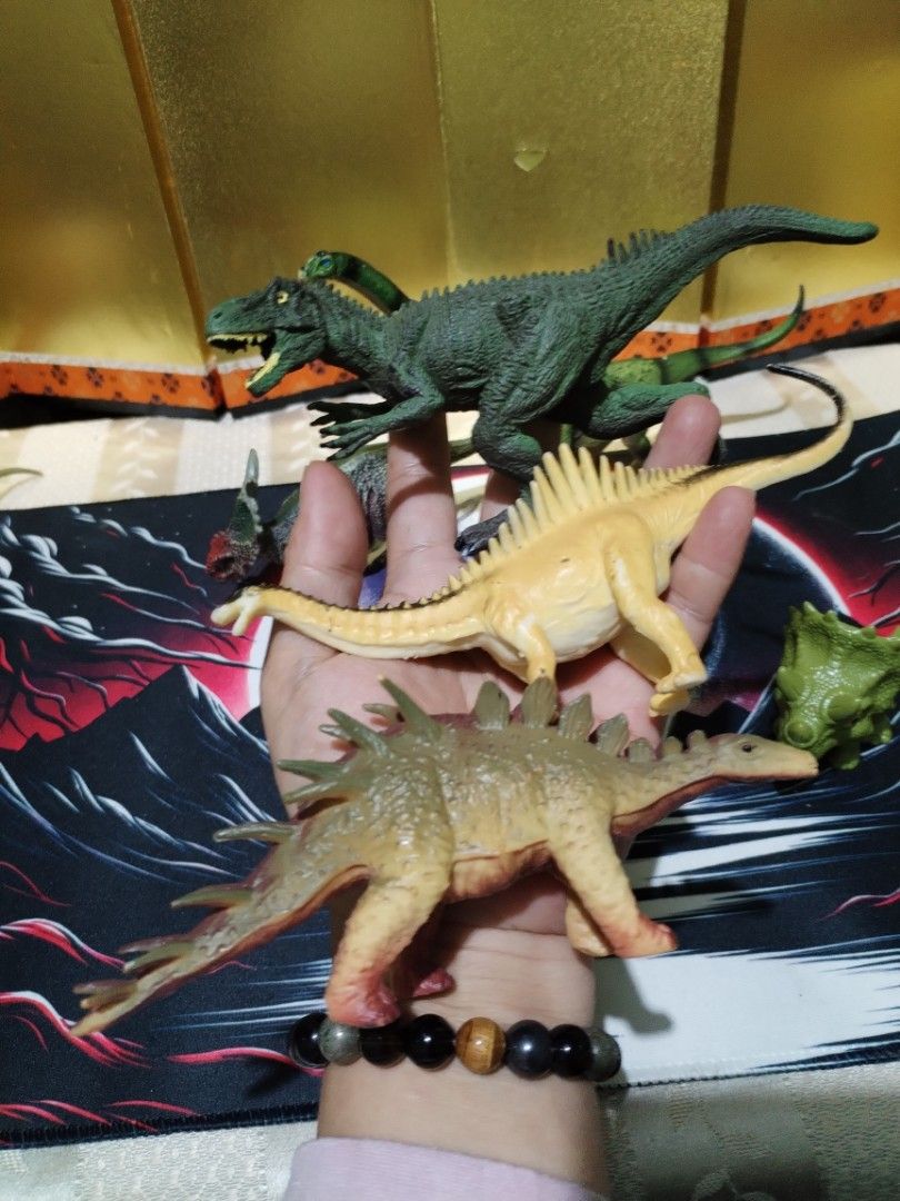 Assorted Dinosaur Toy Figures Set (Category: Figurines & Statues) located in La Trinidad. Submitted by malditas (Listing ID 1470705529, Image 3). Description: - Lot of plastic dinosaur action figures - Includes T-Rex, Triceratops, Brachiosaurus, Stegosaurus, and raptors - Assorted colors and sizes - Perfect for kids' playtime, gifts, or collection displays - Selling as a complete set (all items included as seen in photos) - Meet-up or shipping op