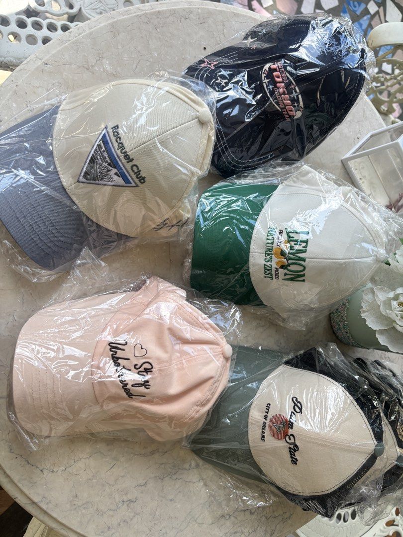 Assorted Embroidered Baseball Caps and Trucker Hats (Category: Caps & Hats) located in Antipolo. Submitted by annesmarket (Listing ID 1470573527, Image 3). Description: - Brand new casual caps with stylish embroidered designs - Available styles: Lemon Nature's Zest, Stay Unbothered, Palm State City of Dreams, Tokyo Racing Team, and Racquet Club - Colors: White, green, pink, dark navy, and cream - Standard adjustable strapback for a comfortable fi