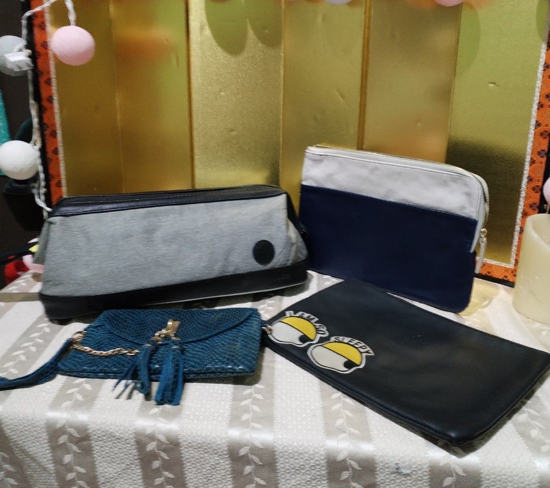 Assorted Fashion Pouches and Clutches Bundle Set (Category: Purses & Pouches) located in La Trinidad. Submitted by malditas (Listing ID 1470706420, Image 1). Description: - Bundle of 4 versatile bags and pouches - Blue & white zippered pouch for everyday use From HT box BUY AS IS (NO RETURN, NO EXCHANGE, NO REFUND unless stated) LOCATION For dropping: BAGUIO- Mabini LA TRINIDAD - KM. 5 SHIPPING via J&T + SF payment 1stFrom HT box BUY AS IS (NO RE