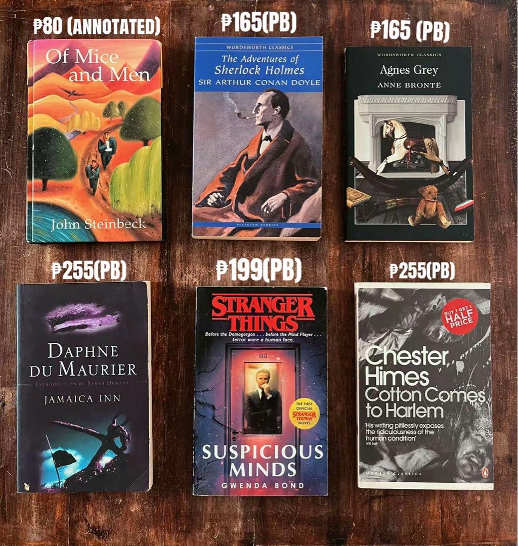 Assorted Fiction and Classic Novels Paperback Books (Category: Storybooks) located in Maragondon. Submitted by quilljoylibrary (Listing ID 1470662147, Image 1). Description: - Title: Bookshelf Clear-out - Formats: Various paperbacks - Available Titles: Of Mice and Men, The Adventures of Sherlock Holmes, Agnes Grey, Jamaica Inn, Stranger Things Suspicious Minds, Cotton Comes to Harlem - How to Order: DM for specific book availability and prices.