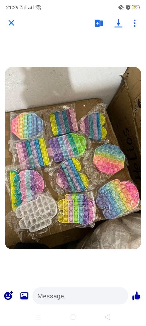 Assorted Rainbow Pop It Fidget Toys (Category: Kids Toys) located in Talisay. Submitted by arnilynluc61194 (Listing ID 1470732245, Image 1). Description: - Variety of silicone Pop It sensory toys available - Colors: Rainbow and pastel shades - Shapes: Hearts, squares, octagons, and astronauts - Packaging: Individually wrapped in plastic - Perfect stress relief toy for both kids and adults - Available per piece or as a complete set.