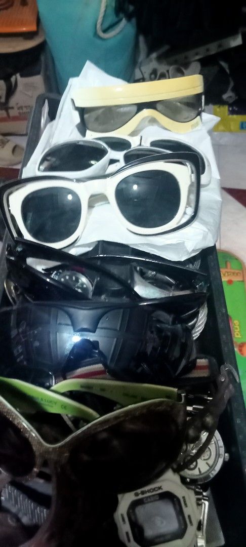 Assorted Sunglasses and Watches Bundle Lot (Category: Sunglasses & Eyewear) located in Paranaque City. Submitted by dimaguilaa24827 (Listing ID 1470654304, Image 1). Description: - All-in-one accessory bundle to upgrade your style - Includes chunky white frames, yellow visor, black sporty shades, and patterned oversized frames - Comes with a couple of stylish wristwatches mixed in - Great for daily wear, backups, or expanding your collection - Se