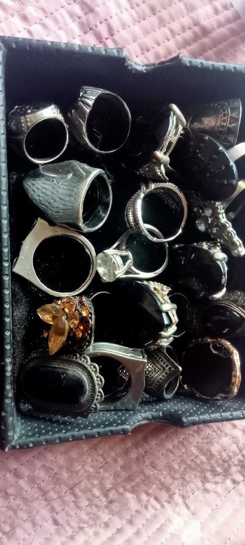 Assorted Vintage Style Black Stone Rings Lot (Category: Rings) located in Paranaque City. Submitted by dimaguilaa24827 (Listing ID 1470648550, Image 2). Description: - Set of statement rings sold together - Mostly silver-tone metal with dark, black, and amber-colored stones - Variety of designs: filigree, chunky shapes, geometric, and ornate settings - Assorted ring sizes included - Ideal for gothic, boho, or alternative fashion looks assorted .