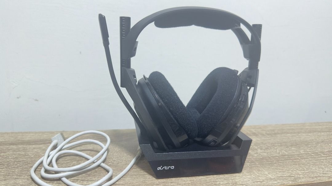 Astro Gaming Headset with Base Station (Category: Headphones & Headsets) located in Manila. Submitted by lonegamerxgoodfinds (Listing ID 1470581347, Image 3). Description: - Model: Black Astro Gaming Headset with charging base station - Condition: Clean, well-maintained, and 100% working - Features: Adjustable boom microphone on the left, intact fabric ear cushions and headband padding - Compatibility: Great for both PC and console gaming setups 