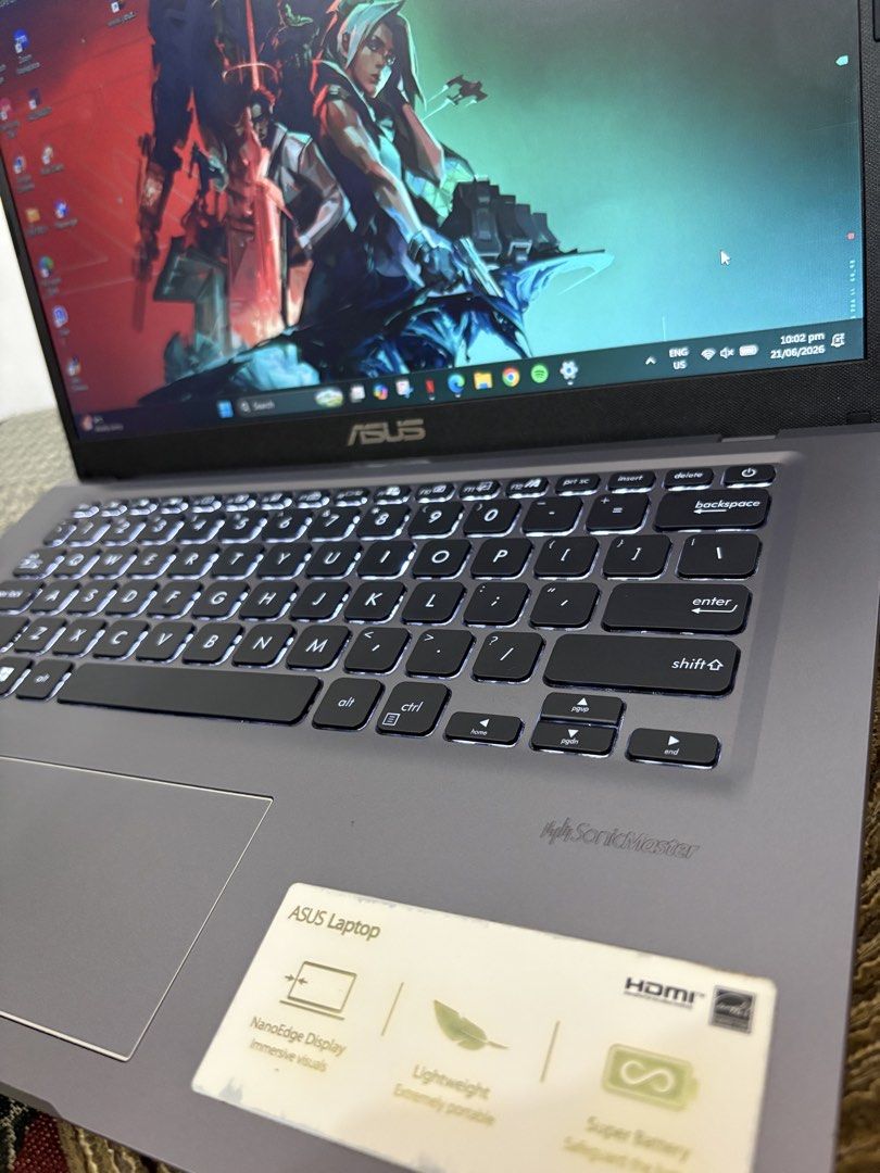 ASUS Laptop AMD Ryzen 3 Radeon Graphics (Category: Laptops & Notebooks) located in Makati City. Submitted by bryyyyyyyy16 (Listing ID 1470663731, Image 1). Description: - Brand/Model: ASUS Laptop (Gray chassis) - Processor: AMD Ryzen 3 - Graphics: AMD Radeon Graphics - Display: NanoEdge display - Keyboard: Backlit keyboard - OS: Windows - Customization: Lid is covered with various pop culture stickers; McDonald's logo sticker on the palm rest - C