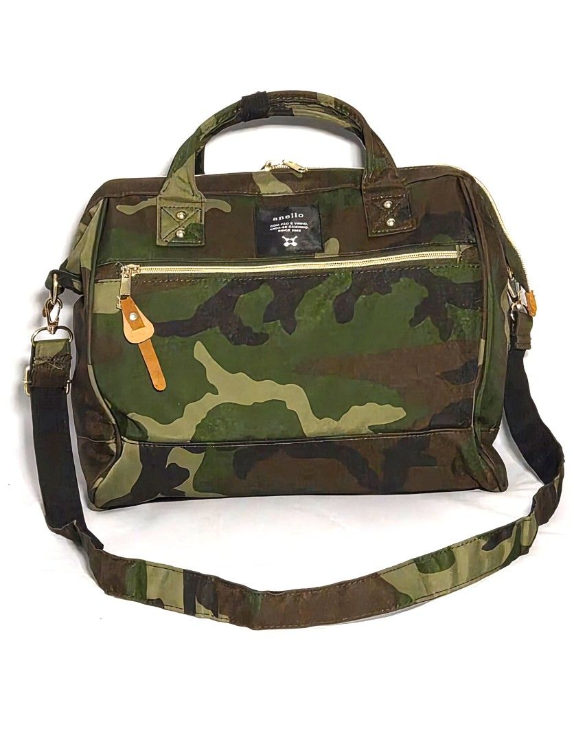 Authentic Anello 2-Way Boston Shoulder Bag (Camo) - (Category: Cross-body Bags) located in Antipolo. Submitted by saribymonica (Listing ID 1470560513, Image 1). Description: Authentic Anello 2-Way Boston Shoulder Bag (Camo) - Like New Condition: Like New (Used only twice) Description: Selling an authentic Anello 2-Way Boston Bag in a classic Camouflage print. This has only been used twice, so it is in immaculate, like-new condition. No fading, no