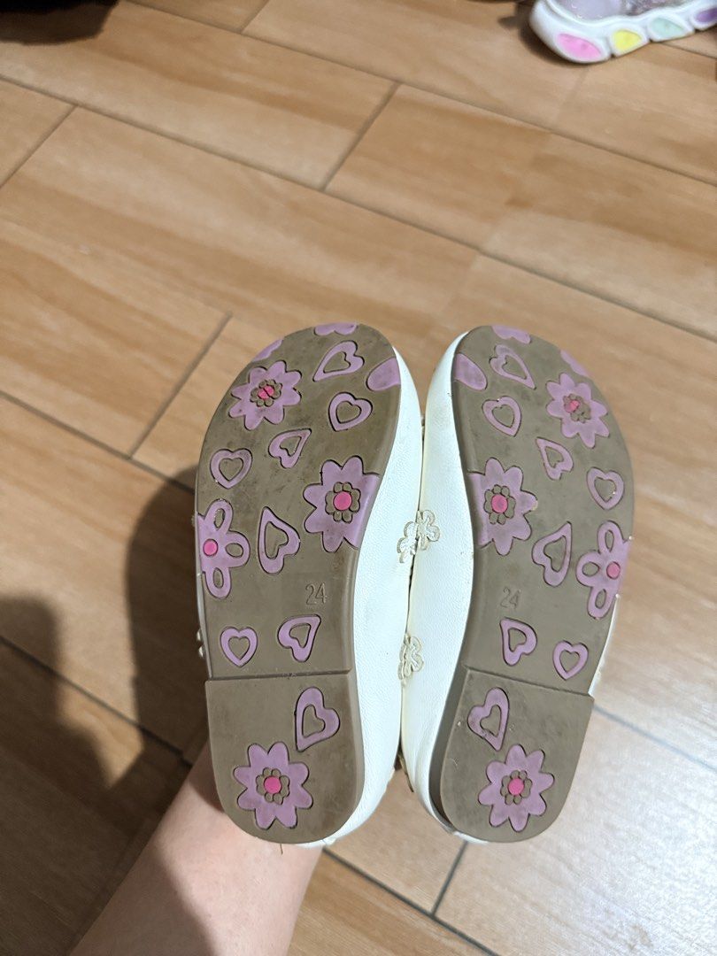 Authentic Barbie shoes (Category: Babies & Kids Fashion) located in Cagayan de Oro. Submitted by shincin11 (Listing ID 1470662201, Image 2). Description: - Item: White Barbie Mary Jane flats for kids - Size: 24 (marked on outsole with cute flower and heart tread) - Design: Adorable flower appliqués on the upper with pink Barbie silhouettes and branding on the inner sole - Convenience: Elastic strap across the top for easy slip-on and off - Condit