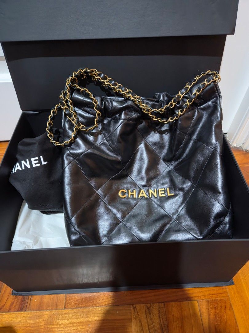 Authentic Chanel 22 Small Black Shoulder Bag (Category: Luxury Bags & Wallets) located in Cebu City. Submitted by golden123 (Listing ID 1470560292, Image 2). Description: bought from a reputable seller comes with box, paperbag, receipt gently used, no major flaws guaranteed authentic microchipped negotiable for sure buyers item is in cebu.