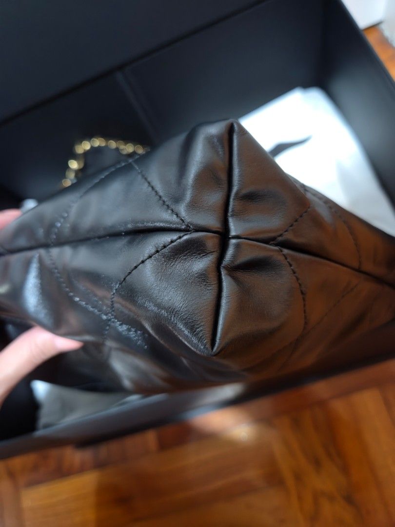 Authentic Chanel 22 Small Black Shoulder Bag (Category: Luxury Bags & Wallets) located in Cebu City. Submitted by golden123 (Listing ID 1470560292, Image 3). Description: bought from a reputable seller comes with box, paperbag, receipt gently used, no major flaws guaranteed authentic microchipped negotiable for sure buyers item is in cebu.