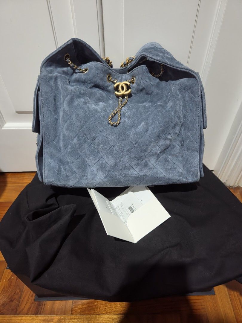 Authentic Chanel 25 Medium in Blue Suede Shoulder Bag (Category: Luxury Bags & Wallets) located in Cebu City. Submitted by golden123 (Listing ID 1470560485, Image 1). Description: guaranteed authentic bought personally from Chanel in Seoul Airport complete inclusions with receipt has some dirt (very small dots) on the sides and very light marks in front but hardly noticeable i think these can be cleaned by an expert see pics for details microchip