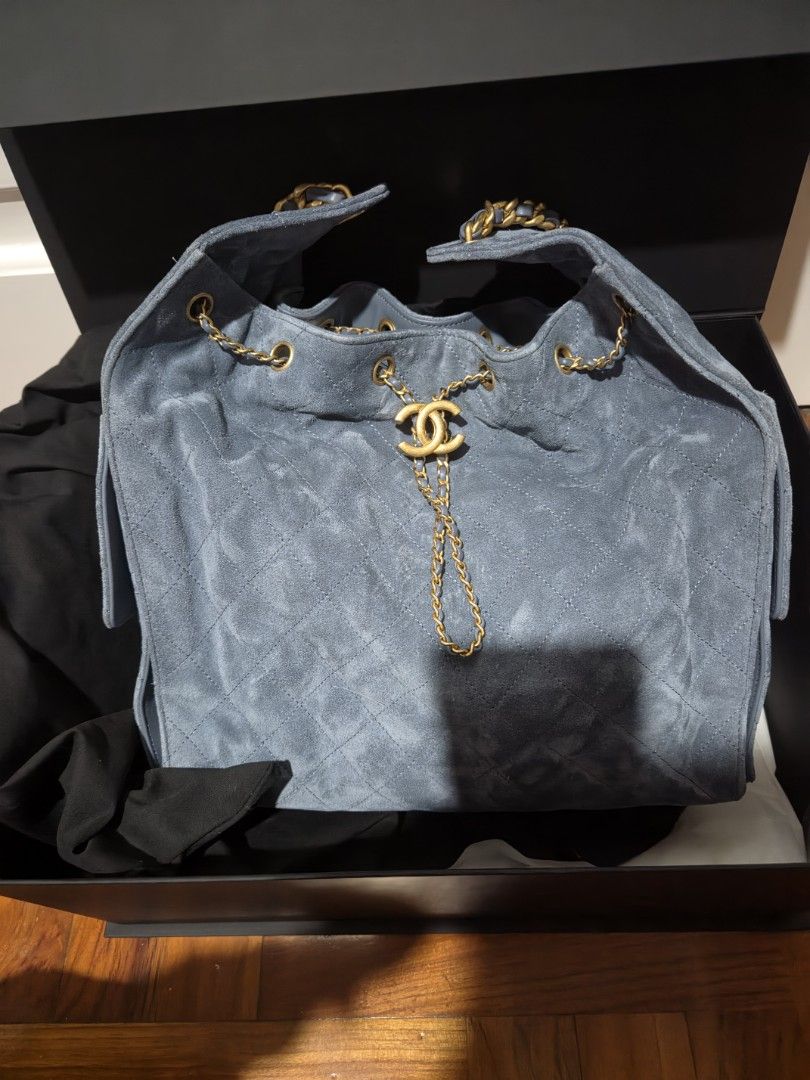 Authentic Chanel 25 Medium in Blue Suede Shoulder Bag (Category: Luxury Bags & Wallets) located in Cebu City. Submitted by golden123 (Listing ID 1470560485, Image 2). Description: guaranteed authentic bought personally from Chanel in Seoul Airport complete inclusions with receipt has some dirt (very small dots) on the sides and very light marks in front but hardly noticeable i think these can be cleaned by an expert see pics for details microchip