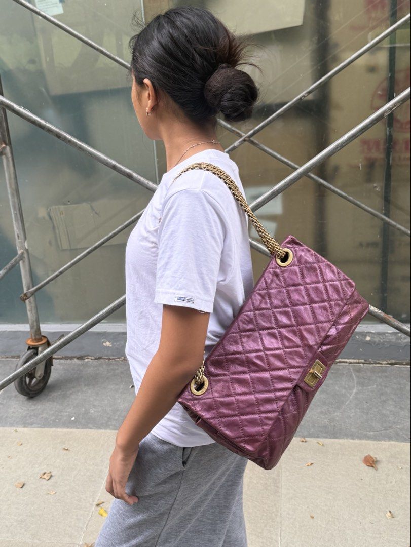 Authentic Chanel Re Issue 2.55 Metallic Plum Double Flap (Category: Luxury Bags & Wallets) located in Manila. Submitted by bagladyyy (Listing ID 1470646323, Image 2). Description: Authentic with cert of authenticity Jumbo size Double Flap Metallic Plum Gold hardware Very good condition.
