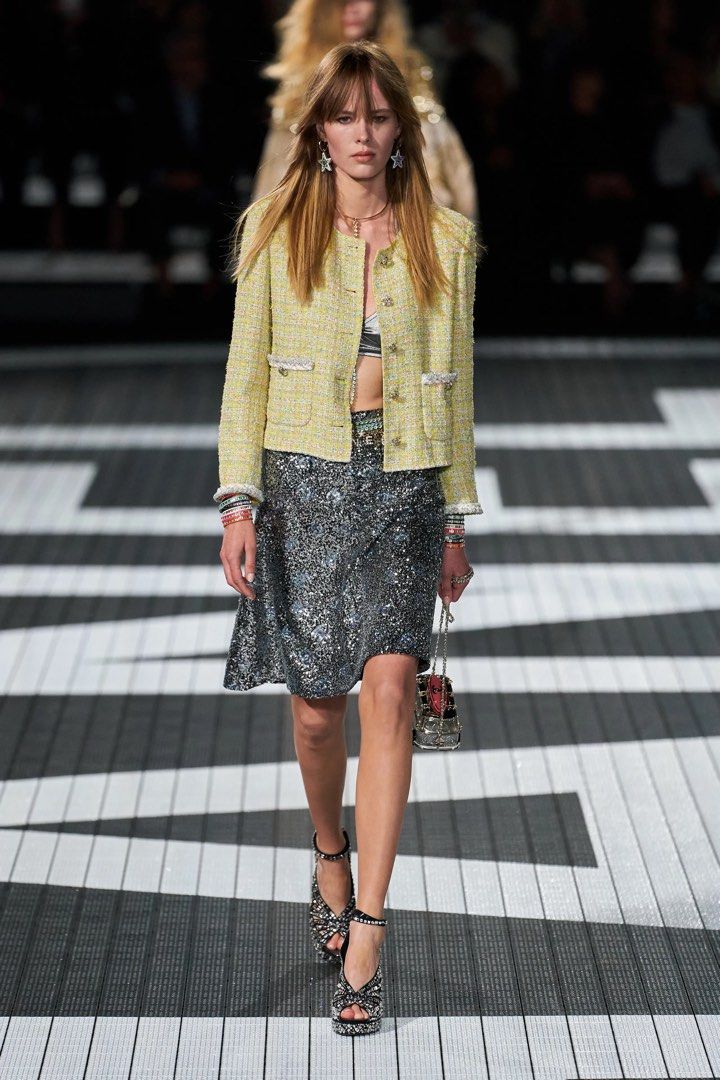 Authentic CHANEL Yellow Iridescent Tweed Runway Jacket (Category: Luxury Apparel) located in Manila. Submitted by serendipitymanila (Listing ID 1470645643, Image 3). Description: - Brand: Authentic Chanel Runway Tweed Jacket - Color: Bright yellow with multicolour flecks and vibrant yellow silk lining - Details: Sparkling crystal rhinestone buttons on front, pockets, and sleeve cuffs with elegant braided trim - Extras: Includes extra fabric swatc
