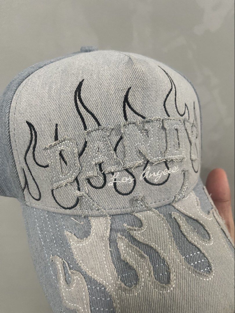 Authentic Dandy Hats Light Blue Denim Flame Cap | Below SRP (Category: Caps & Hats) located in Manila. Submitted by oseancollective.official (Listing ID 1470619344, Image 2). Description: Upgrade your streetwear game without breaking the bank! Get this stylish Dandy Hats denim cap at a sulit price. At OSean Collective, we bring you authentic branded caps at affordable prices, without unnecessary markups. ✅ 100% Authentic ✅ BELOW SRP ✅ 100% Money-