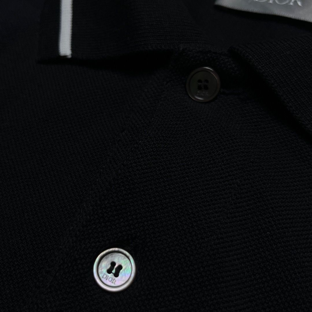 Authentic Dior Bee Embroidered Polo Shirt Black (Category: Tshirts & Polo Shirts ) located in Caloocan City. Submitted by achilles_grails (Listing ID 1470727876, Image 3). Description: - Brand: Dior - Item: Black knit polo shirt - Size: L - Material: 100% cotton (Made in Italy) - Details: Contrasting white stripes on collar and sleeves, iconic embroidered bee logo on chest, branded mother-of-pearl buttons - Condition: Clean and well-maintained - 