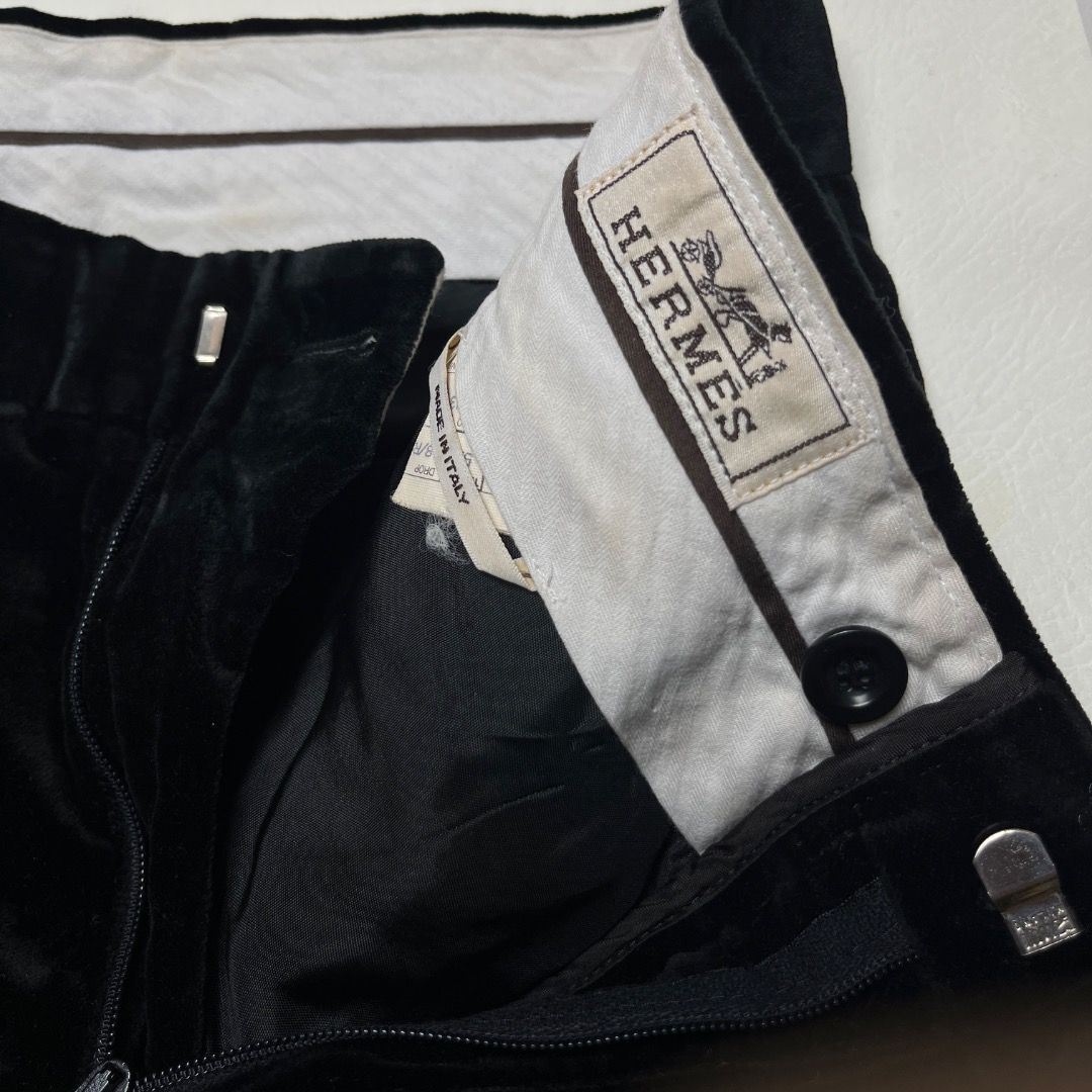 Authentic Hermès Black Velvet Trousers (Category: Trousers) located in Caloocan City. Submitted by achilles_grails (Listing ID 1470565114, Image 2). Description: - Brand: Hermès - Color: Black - Origin: Made in Italy - Material: Soft velvet texture with clean interior lining - Fit: Classic tailored fit with a structured waistband - Closure: Front zip - Condition: Premium designer piece.
