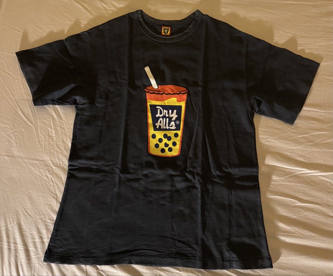 Authentic Human Made Bubble Tea TEE (Category: Tshirts & Polo Shirts ) located in Manila. Submitted by aahahanyenye (Listing ID 1470720087, Image 2). Description: - Human Made Grey-ish to Black (Almost like faded color) Bubble Tea Shirt - Authentic (As seen in the fabric of the shirt) - Rare Auth Piece in my opinion Message for Questions.