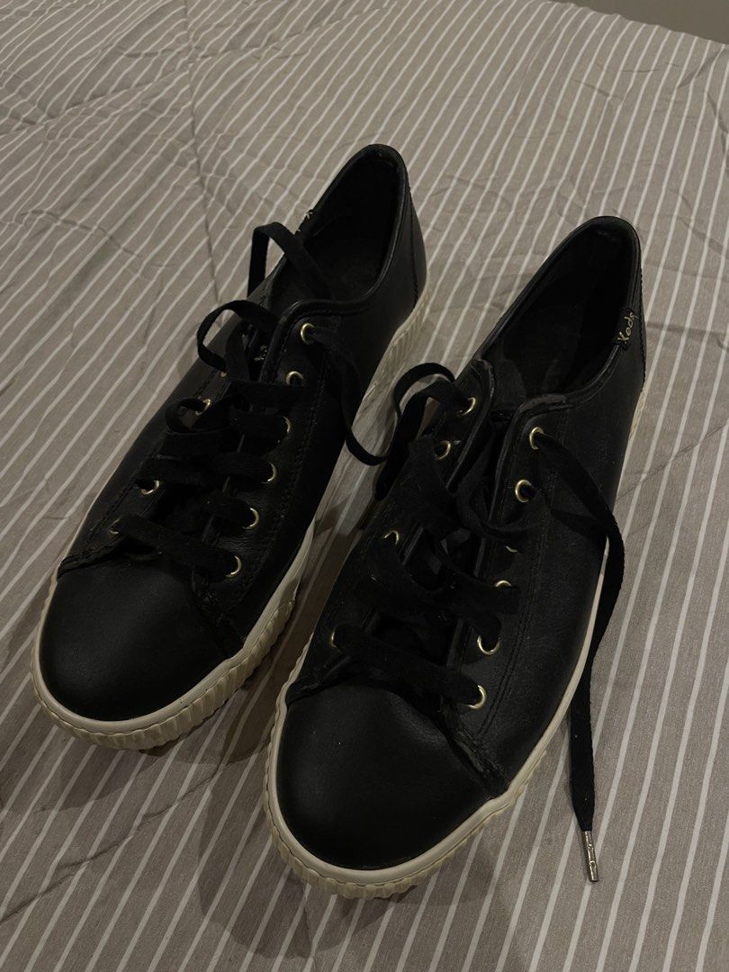 Authentic Keds Black Leather Platform Sneakers (Category: Sneakers) located in Las Pinas. Submitted by francesaly (Listing ID 1470723963, Image 1). Description: Classic black leather sneakers from Keds with gold eyelet accents and a subtle platform sole. Easy to wipe clean and versatile for any casual fit!.