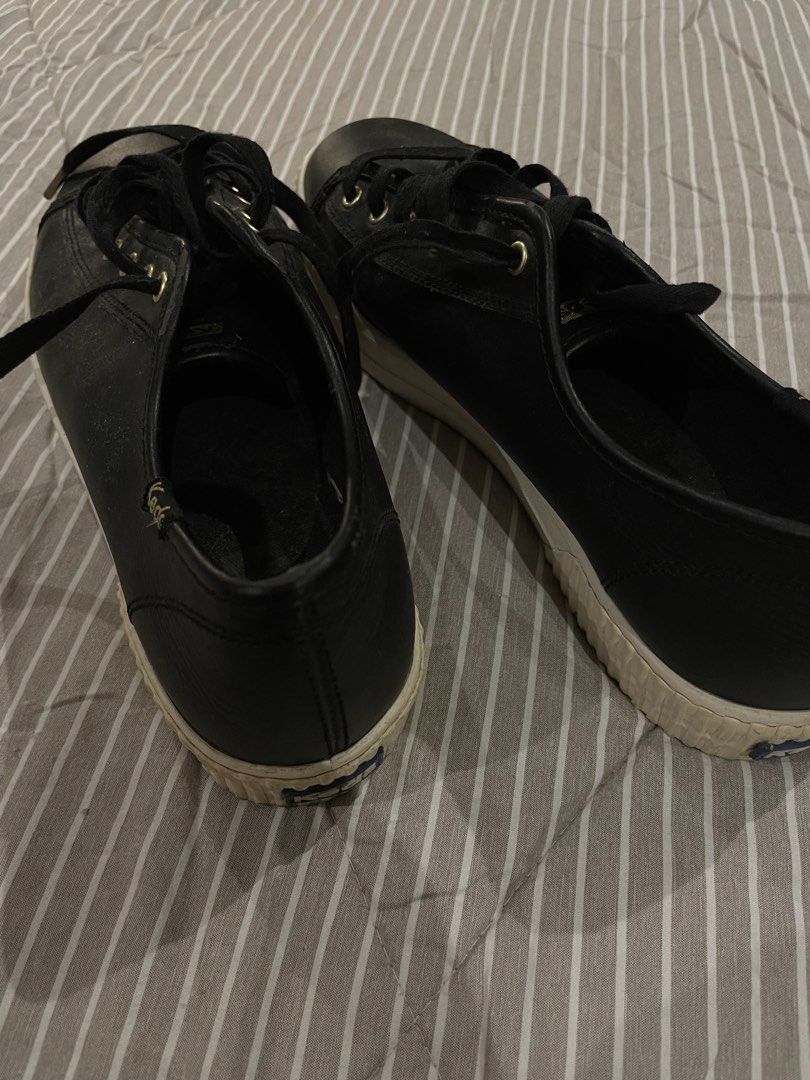 Authentic Keds Black Leather Platform Sneakers (Category: Sneakers) located in Las Pinas. Submitted by francesaly (Listing ID 1470723963, Image 2). Description: Classic black leather sneakers from Keds with gold eyelet accents and a subtle platform sole. Easy to wipe clean and versatile for any casual fit!.