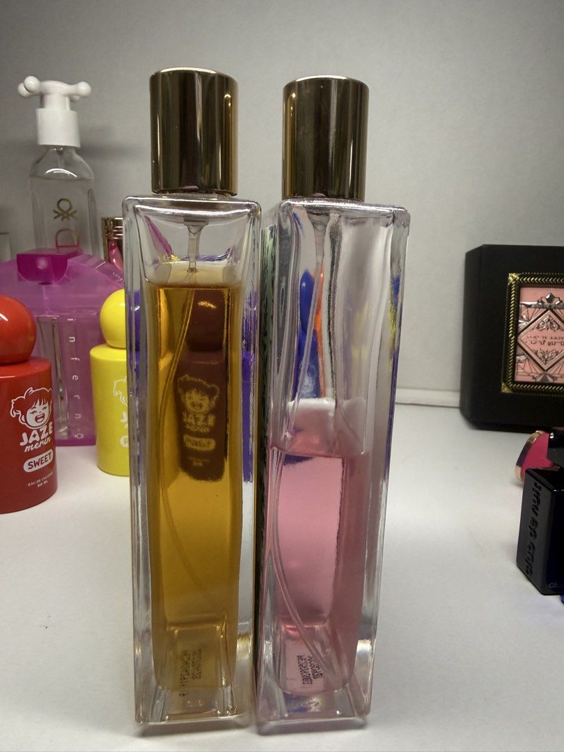 Authentic Perfume Dessert 700 for both (Category: Fragrance & Deodorants) located in Bulacan. Submitted by mangoloviiee (Listing ID 1470657914, Image 2). Description: - Brand: Perfume Dessert London - Type: Eau de Parfum (EDP) - Size: 100ml per bottle - Variant 1 (Left): Matcha Au Lait (yellow tint, almost full) - Variant 2 (Right): Peony & Red Apples (pink tint, about half full) - Includes: Original gold-colored caps - RFS: Decluttering, great w