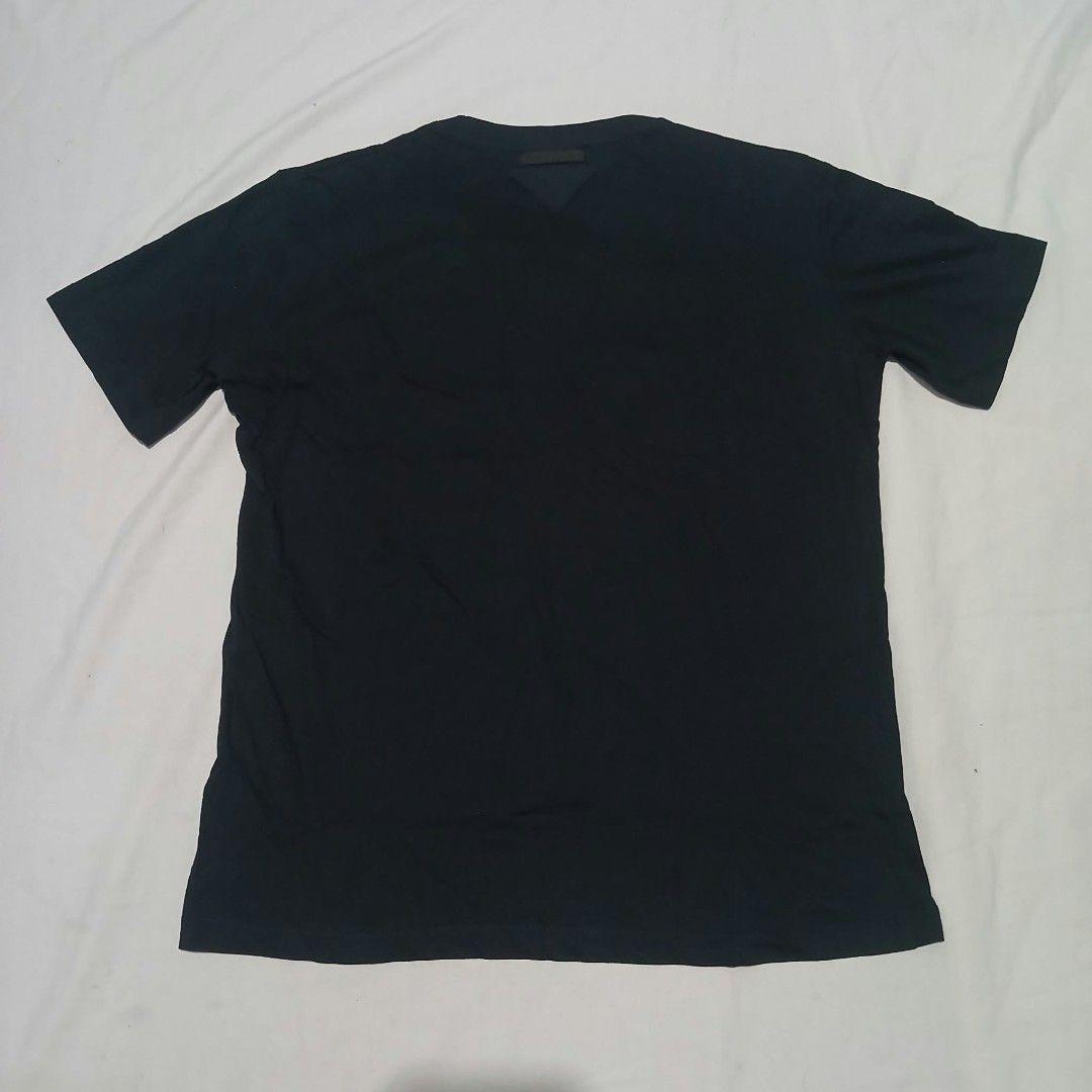 Authentic Prada Floral Applique T-Shirt (Category: Shirts) located in Mangaldan. Submitted by used2.wearwomens (Listing ID 1470675051, Image 2). Description: Good Condition No Issue Size Large On Tag Width 19 Length 22.5 Kindly Check All Posted Pictures.