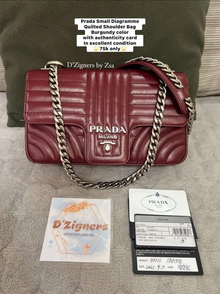 Authentic Prada Small Diagramme Quilted bag (Category: Luxury Bags & Wallets) located in Quezon City. Submitted by DZignersbyZsa (Listing ID 1470568615, Image 1). Description: Authentic Prada Small Diagramme Quilted Bag Rare and hard to source 🔥 Burgundy color 🍷 With authenticity card clean in and out .