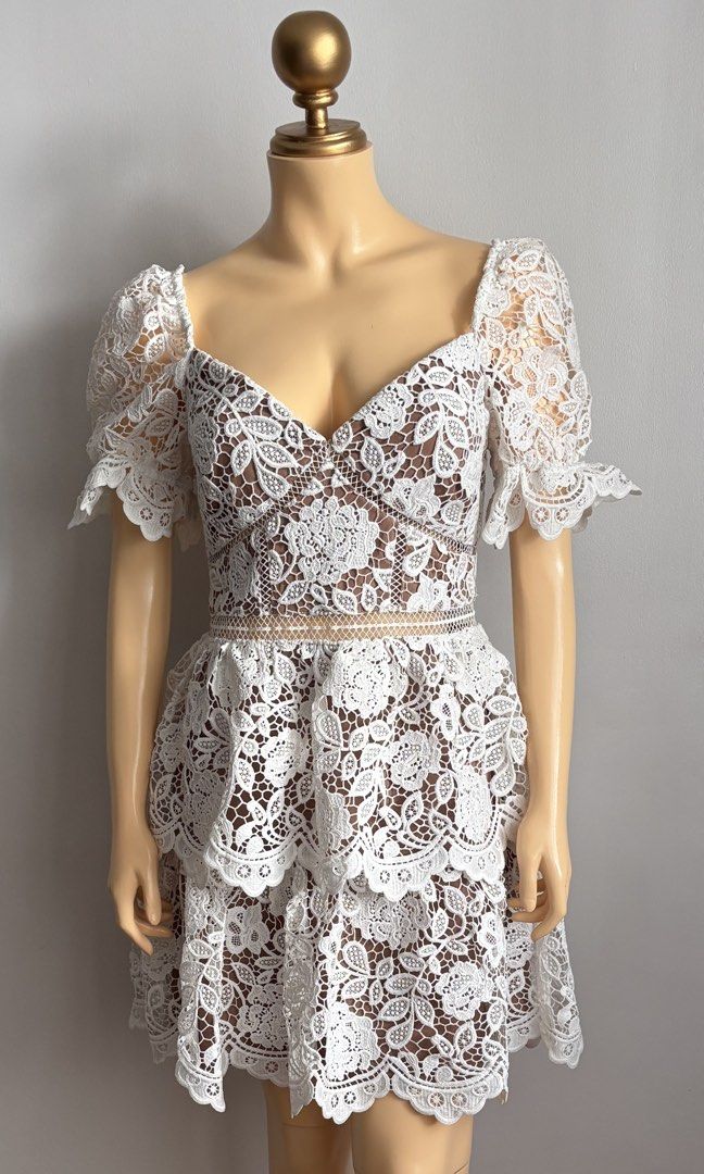 Authentic self portrait white flower lace mini dress (Category: Dresses) located in Quezon City. Submitted by swift_kenjie (Listing ID 1470565111, Image 3). Description: 🤍 AUTHENTIC SELF-PORTRAIT WHITE FLOWER LACE MINI DRESS 🤍 ✨ Brand: Self-Portrait 🇺🇸 Purchased in the USA ✨ Size: UK 10 / US 6 ✨ Best fit: Medium ✨ Elegant white floral lace overlay ✨ Nude lining with beautiful see-through waist detail A gorgeous designer piece for birthdays, p