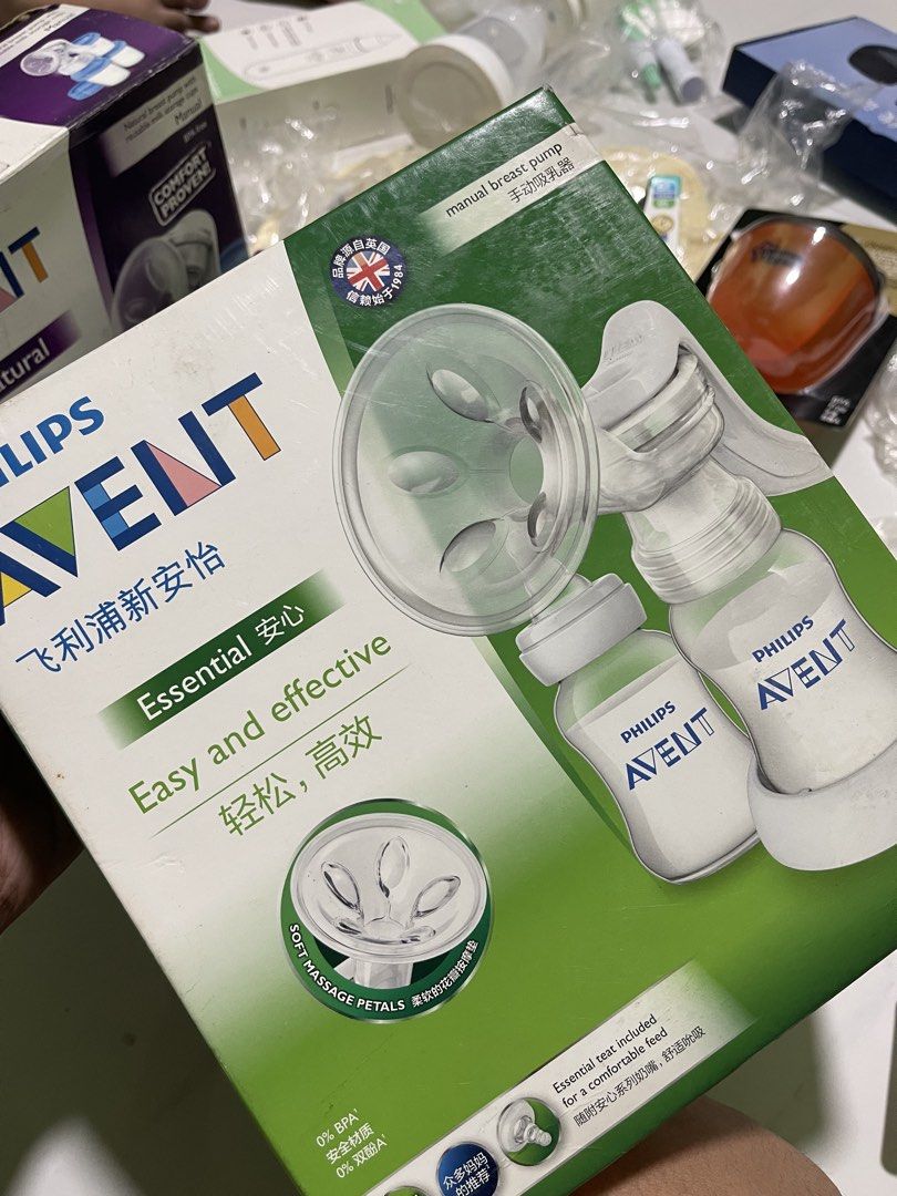 Avent Breastpump with Extra Bottle (Category: Breastfeeding & Bottle Feeding) located in Manila. Submitted by sweetfourshop (Listing ID 1470728558, Image 1). Description: Old Version Manual Breastpump with Extra Feeding Bottle.