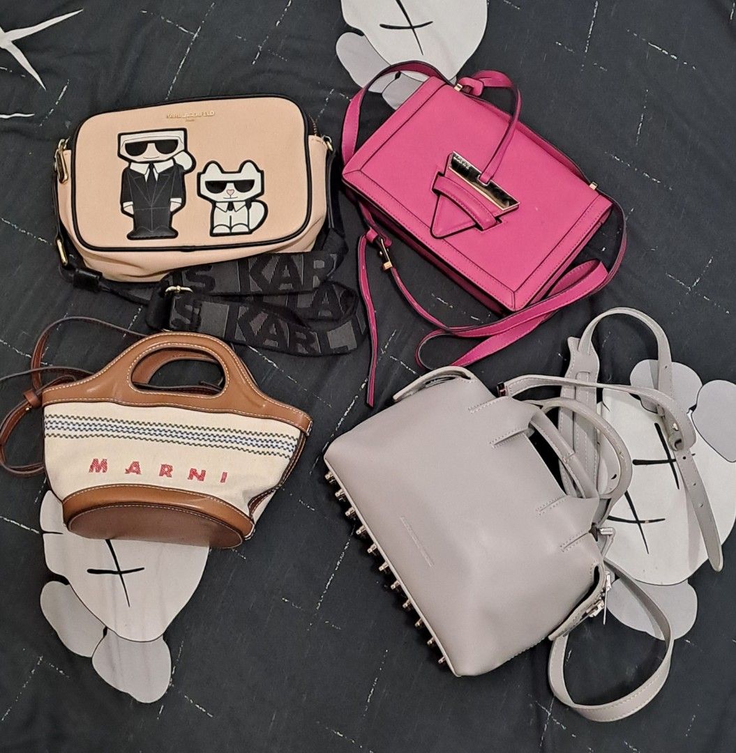 a.wang loewe marni karl l. Bag Set (Category: Cross-body Bags) located in Puerto Princesa. Submitted by jercksthriftph (Listing ID 1470654523, Image 1). Description: P5850 set - Set of 4 versatile bags available (buy as a set or individually) - Karl Lagerfeld bag with wide logo strap - Bright pink structured shoulder bag for a pop of color - Marni canvas bucket bag with chic brown leather trim - Alexander Wang Grey leather shoulder bag complete w