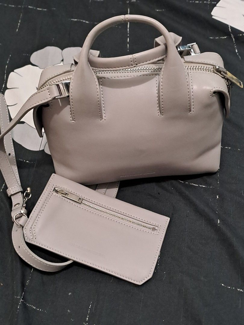 a.wang loewe marni karl l. Bag Set (Category: Cross-body Bags) located in Puerto Princesa. Submitted by jercksthriftph (Listing ID 1470654523, Image 2). Description: P5850 set - Set of 4 versatile bags available (buy as a set or individually) - Karl Lagerfeld bag with wide logo strap - Bright pink structured shoulder bag for a pop of color - Marni canvas bucket bag with chic brown leather trim - Alexander Wang Grey leather shoulder bag complete w