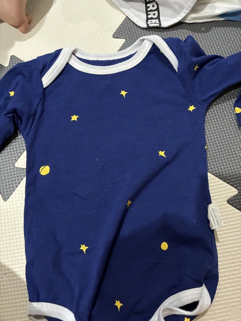 Baby clothing set assorted bodysuits and shorts bundle (Category: Babies & Kids Fashion) located in Makati City. Submitted by chenfrng (Listing ID 1470665691, Image 2). Description: There are many stocks to choose from. - Adorable baby clothes bundle for everyday wear and lounging - Includes Doraemon tank top, blue star bodysuit, white button-up shirt, dog pattern bodysuit, and pink safari sets - Assorted colors: white, blue, pink, and dark blue 