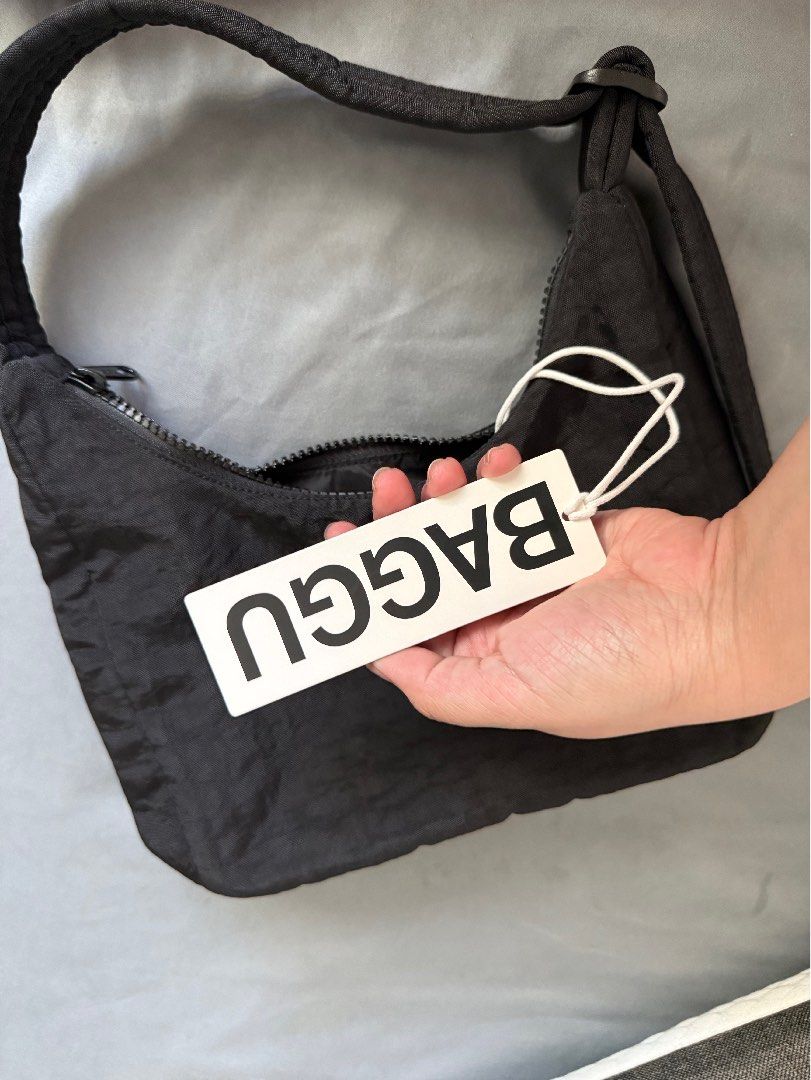 BAGGU mini nylon shoulder bag (Category: Purses & Pouches) located in Quezon City. Submitted by eeezuuhclothes (Listing ID 1470634851, Image 3). Description: - used only twice - RFS: eyeing for a diff color - vvvv high quality - bought in certified calm - with tags pa.