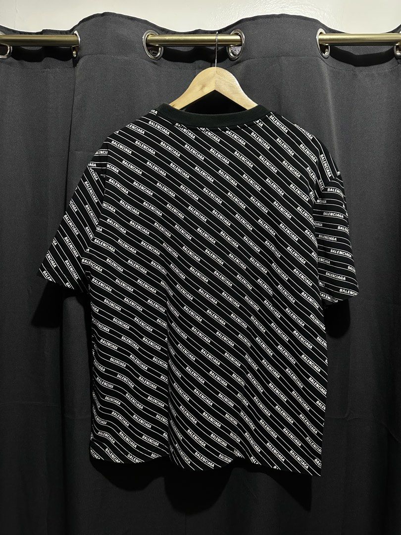 Balenciaga All-Over Logo Print Graphic Tee (Category: Tshirts & Polo Shirts ) located in Buenavista. Submitted by themodernrack (Listing ID 1470593314, Image 2). Description: Condition: Excellent Condition Measurements & Sizing: Size: Tagged Size XXS (Balenciaga oversized fit; fits like standard Men’s S/M) Width (Pit to Pit): 21” Length: 25”.