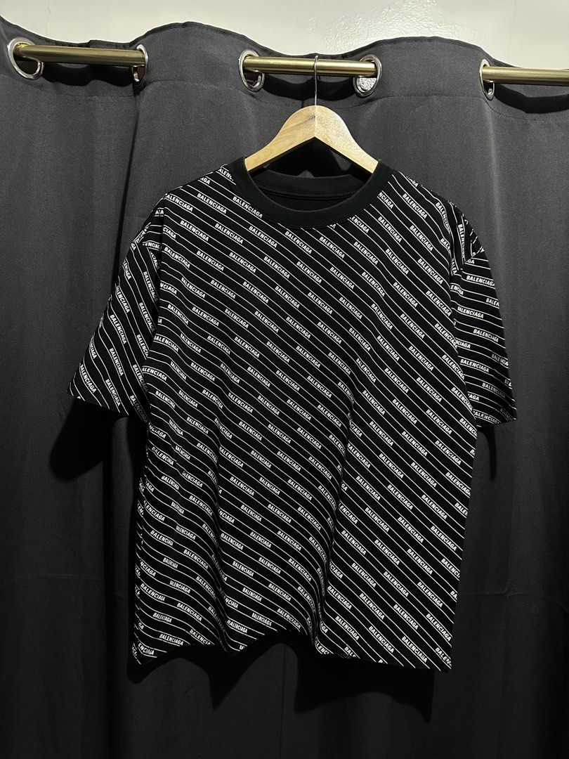 Balenciaga All-Over Logo Print Graphic Tee (Category: Tshirts & Polo Shirts ) located in Buenavista. Submitted by themodernrack (Listing ID 1470593314, Image 1). Description: Condition: Excellent Condition Measurements & Sizing: Size: Tagged Size XXS (Balenciaga oversized fit; fits like standard Men’s S/M) Width (Pit to Pit): 21” Length: 25”.