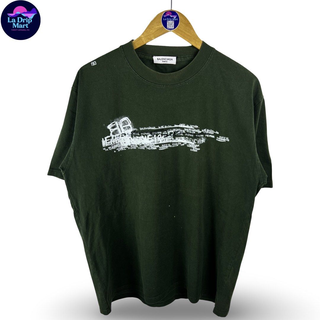‎“BALENCIAGA PARIS” ‎DOODLE SCPRT GRPHC TEE (Category: Tshirts & Polo Shirts ) located in Taguig. Submitted by ldm.ph (Listing ID 1470742652, Image 1). Description: ‎(LDM-C-0279) ‎Size:ACTUAL FIT:LARGE ‎Dimensions ‎Inches width:22 ‎Inches length:29 ‎Condition: EXCELLENT ‎Color rate:9.5 ‎Flaws:dot bleach stains ‎(READY TO WEAR).