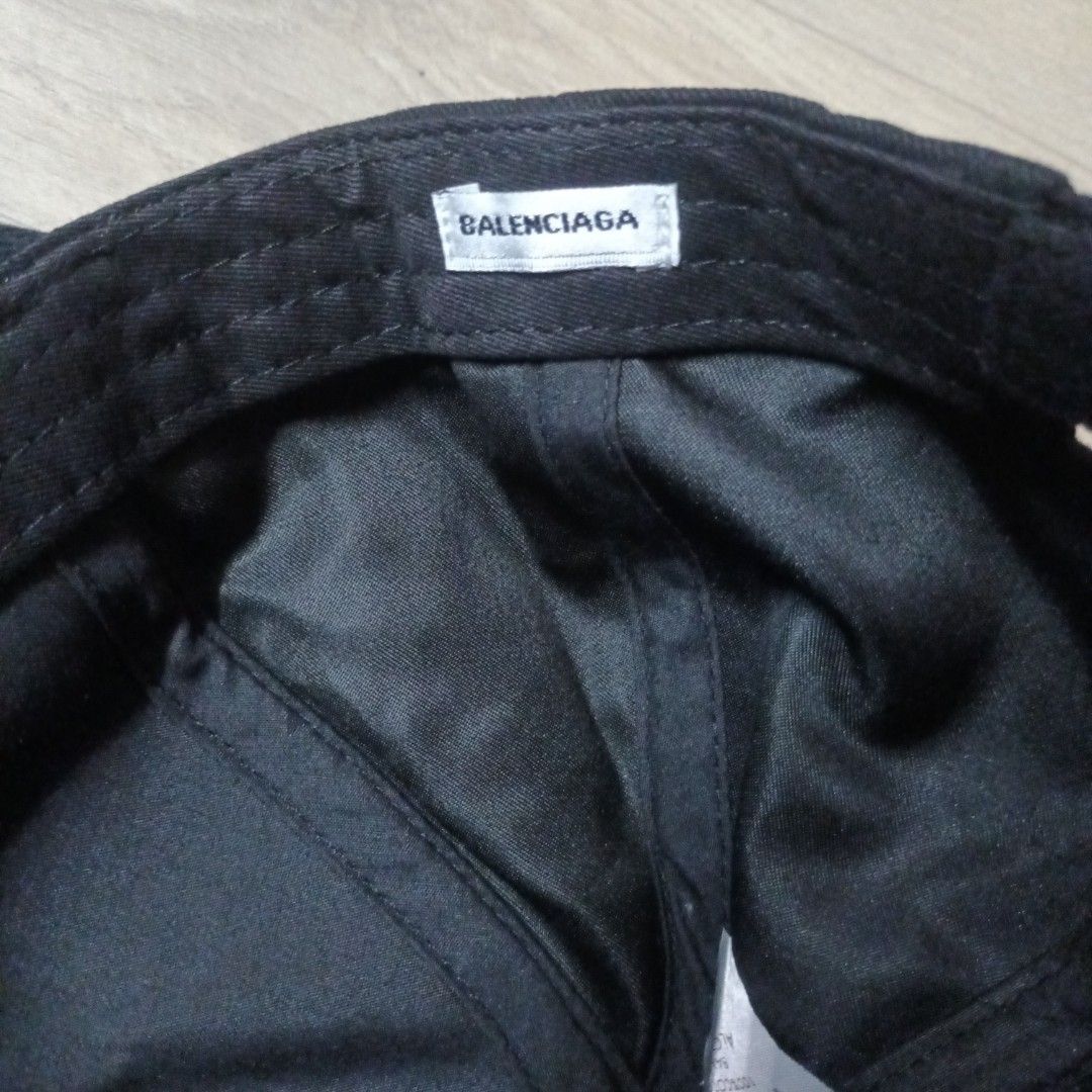 Balenciaga Pride Rainbow Logo Black Cap (Category: Caps & Hats) located in Manila. Submitted by itsnik444 (Listing ID 1470648941, Image 3). Description: - Brand: Balenciaga - Color: Classic black with rainbow embroidered logo on the brim - Fit: Adjustable strap at the back for a customized fit - Details: Authentic interior tag with Balenciaga Paris branding and fabric composition - Condition: Clean, flawless, and shows no signs of wear.