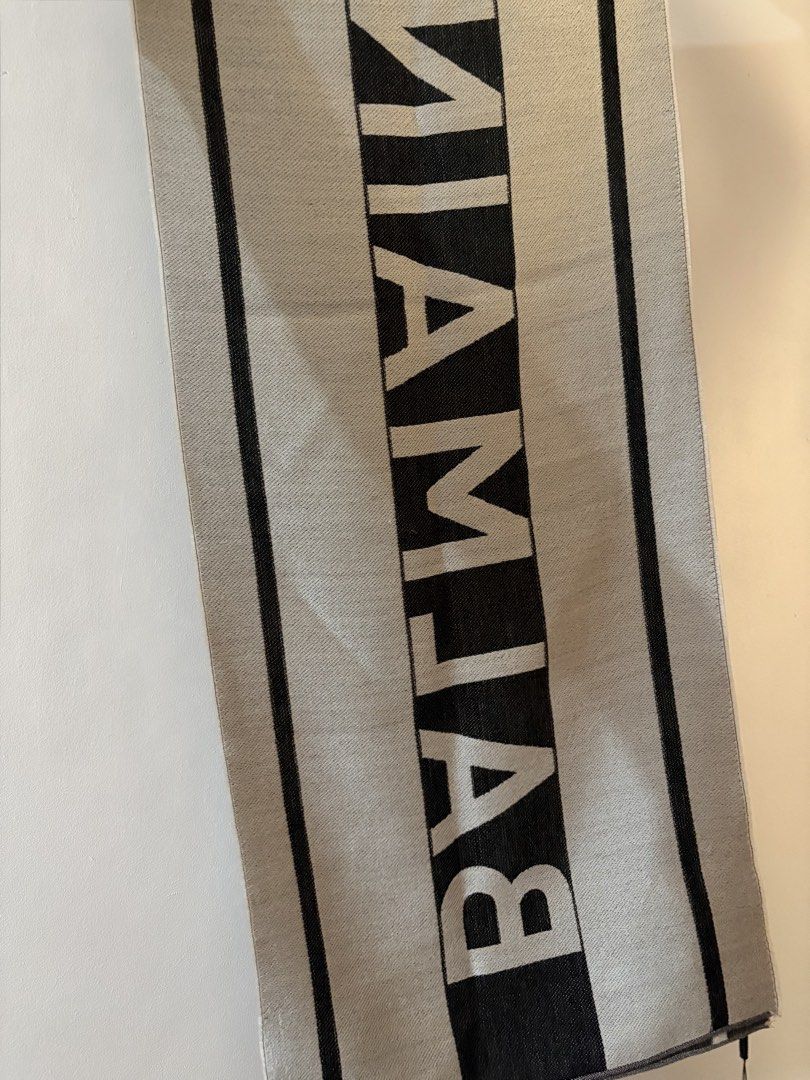 Balmain Monogram Wool Blend Scarf Black White (Category: Scarves) located in Bulacan. Submitted by eloisereyes (Listing ID 1470571173, Image 2). Description: Balmain scarf - has reversible design. Bought for 7k (on sale from 20k original price) , selling it 6k na lang. With paperbag this is brandnew rfs: naliliitan sa width size: width 14.5 inches, length 68 inches.