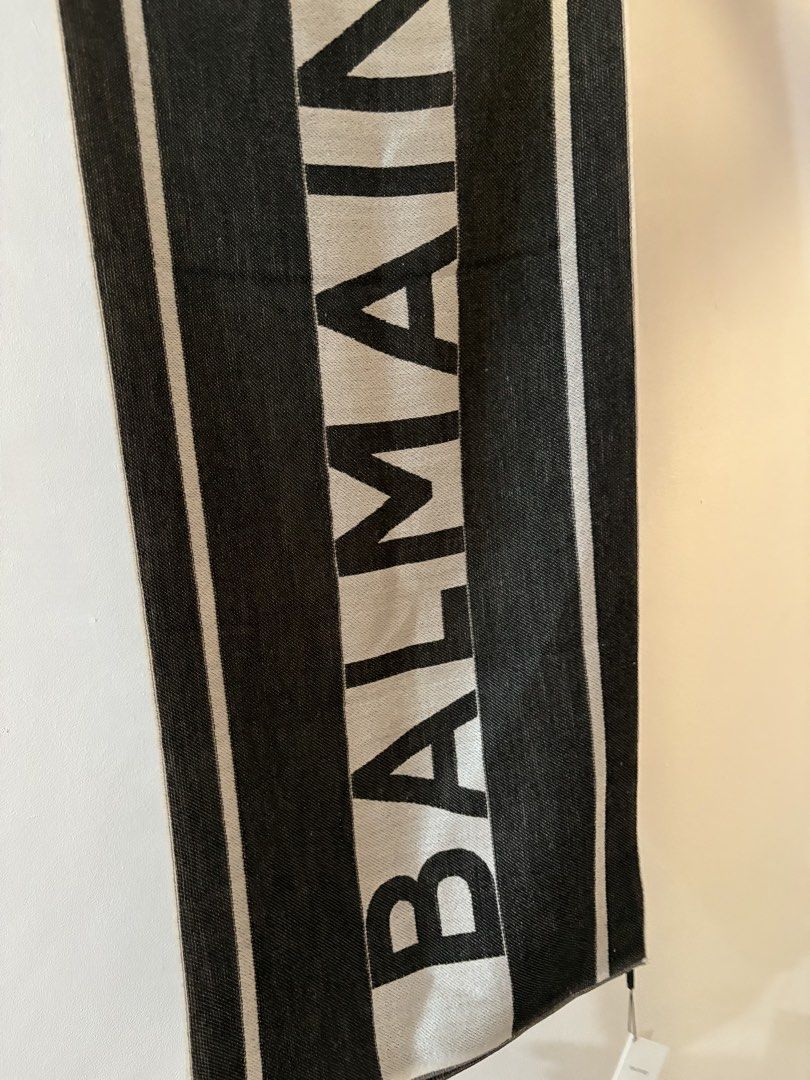 Balmain Monogram Wool Blend Scarf Black White (Category: Scarves) located in Bulacan. Submitted by eloisereyes (Listing ID 1470571173, Image 1). Description: Balmain scarf - has reversible design. Bought for 7k (on sale from 20k original price) , selling it 6k na lang. With paperbag this is brandnew rfs: naliliitan sa width size: width 14.5 inches, length 68 inches.