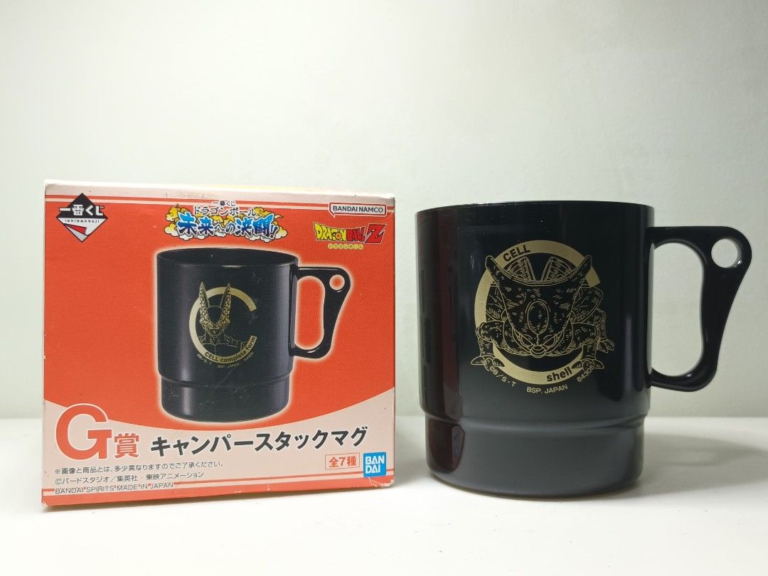 Bandai Dragon Ball Z Cell Camper Stack Mug Prize G (Category: Coffee & Tea Tableware) located in Daet. Submitted by .wenz (Listing ID 1470599365, Image 1). Description: - Authentic Dragon Ball Z Ichiban Kuji Prize G camper stack mug - Sleek black plastic design featuring an iconic gold Cell graphic - Comes complete with original cardboard box packaging - Lightweight and durable, great for daily use or display - A must-have addition to any Dragon 