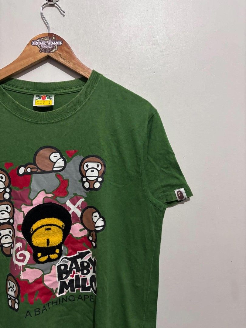 Bape Baby Milo Shirt (Category: Tshirts & Polo Shirts ) located in Bauan. Submitted by onetwothrift2 (Listing ID 1470652826, Image 2). Description: Bape Baby Milo Shirt Size: Large Dimes: L27 W20.5 Color rate: 9/10 Good condition No Issue Mine: 450.