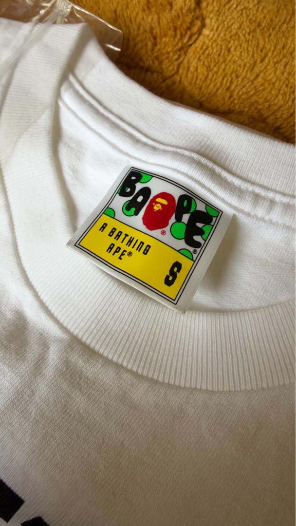 Bape College Tee White (Category: Tshirts & Polo Shirts ) located in Butuan. Submitted by ragscurations (Listing ID 1470591585, Image 3). Description: Brand new condition Used once Flawless Color rate 10/10 Inclusion : Pouch and paper bag Size small no measurements i dont have tape measure Bought from hongkong.