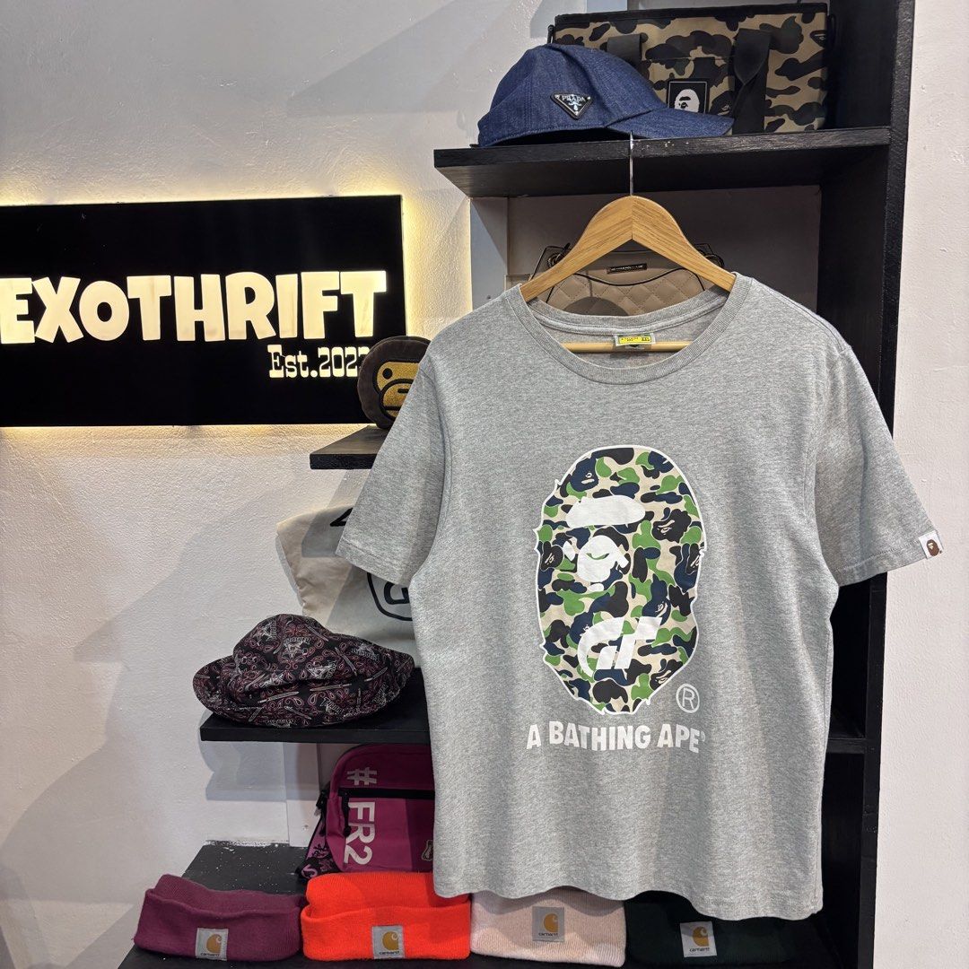 Bape Head Camouflage (Category: Activewear) located in Rizal. Submitted by doyskie.star (Listing ID 1470583044, Image 1). Description: BAPE BIG HEAD GREY SHIRT 20.5 x 27 COMPLETE TAGS GOOD CONDITION.