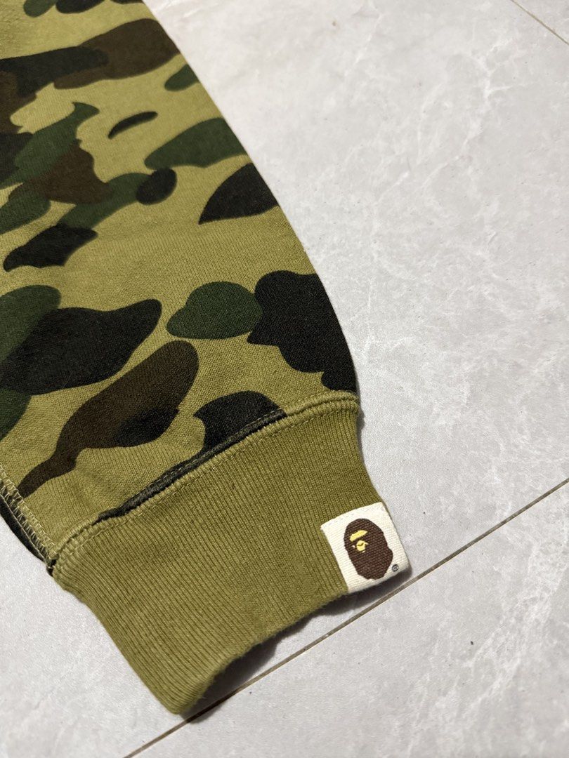 Bape Kids Camo Zip (Category: Hoodies) located in Calumpit. Submitted by Essentiality (Listing ID 1470622758, Image 2). Description: Bape Kids Camo Zip 17x20 M on tag ₱1,500.