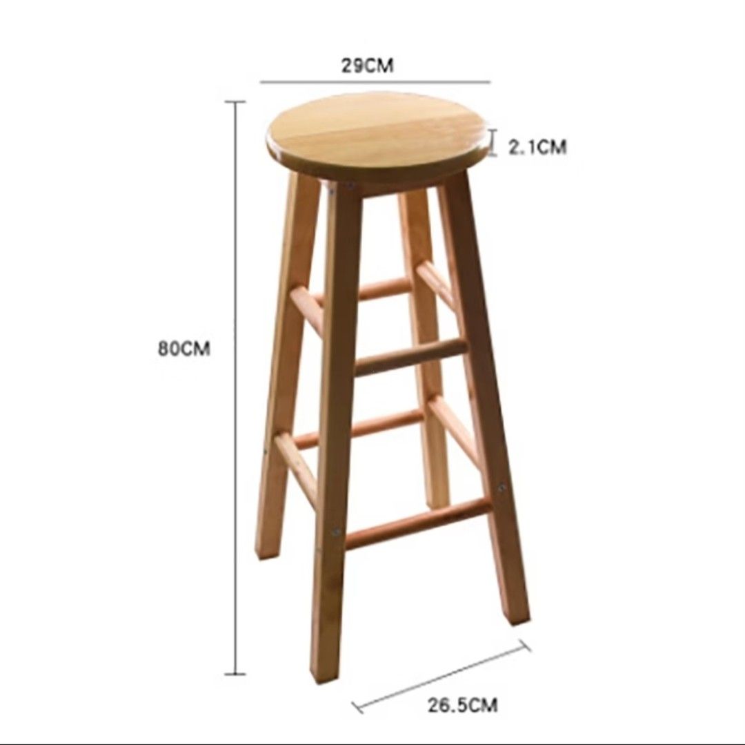 bar stool / kitchen / dining counter chair - 80cm height - solid wood - high - round (Category: Chairs) located in Makati City. Submitted by kimroaa (Listing ID 1470697074, Image 2). Description: - Material: Solid wood with a natural finish - Dimensions: 80cm total height, 29cm round seat - Design: Clean and modern with sturdy footrests - Best for: Breakfast counters, home bars, tall kitchen tables, and compact spaces.