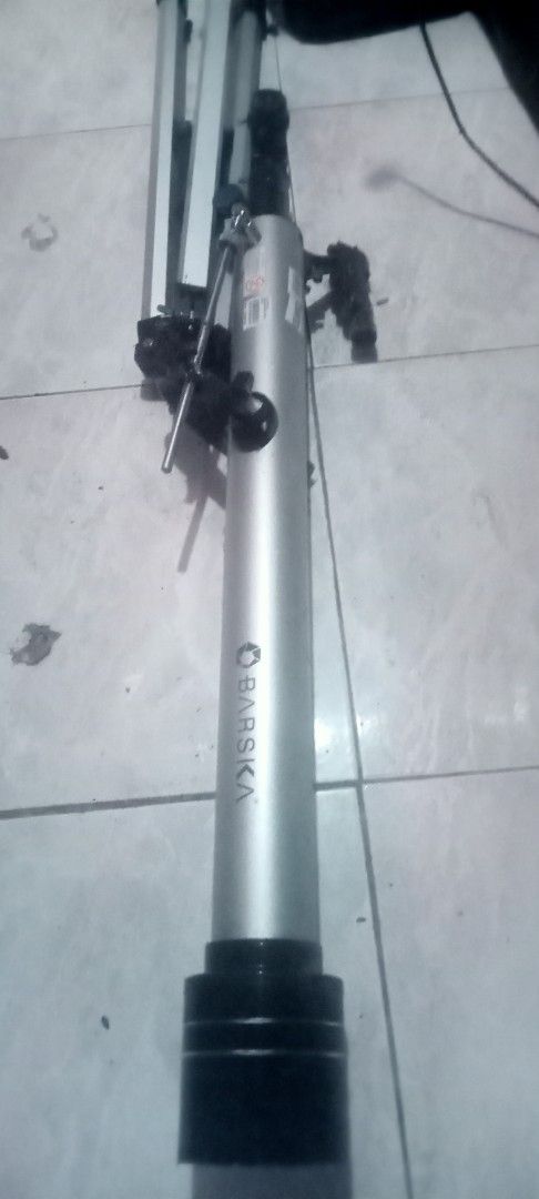 Barska Telescope with Tripod (Category: Tripods & Monopods) located in Paranaque City. Submitted by dimaguilaa24827 (Listing ID 1470639014, Image 2). Description: - Brand: Barska - Design: Silver metal optical tube with black end piece - Inclusions: Adjustable tripod stand and attached finder scope - Hardware: Includes standard focus knobs and mounting hardware - Ideal for: Stargazing and viewing distant landscapes09981762076 - Condition: Good op